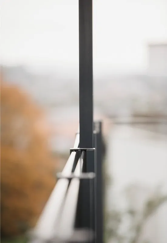 A SlideGlass post and the edges of its glass panes, close up.